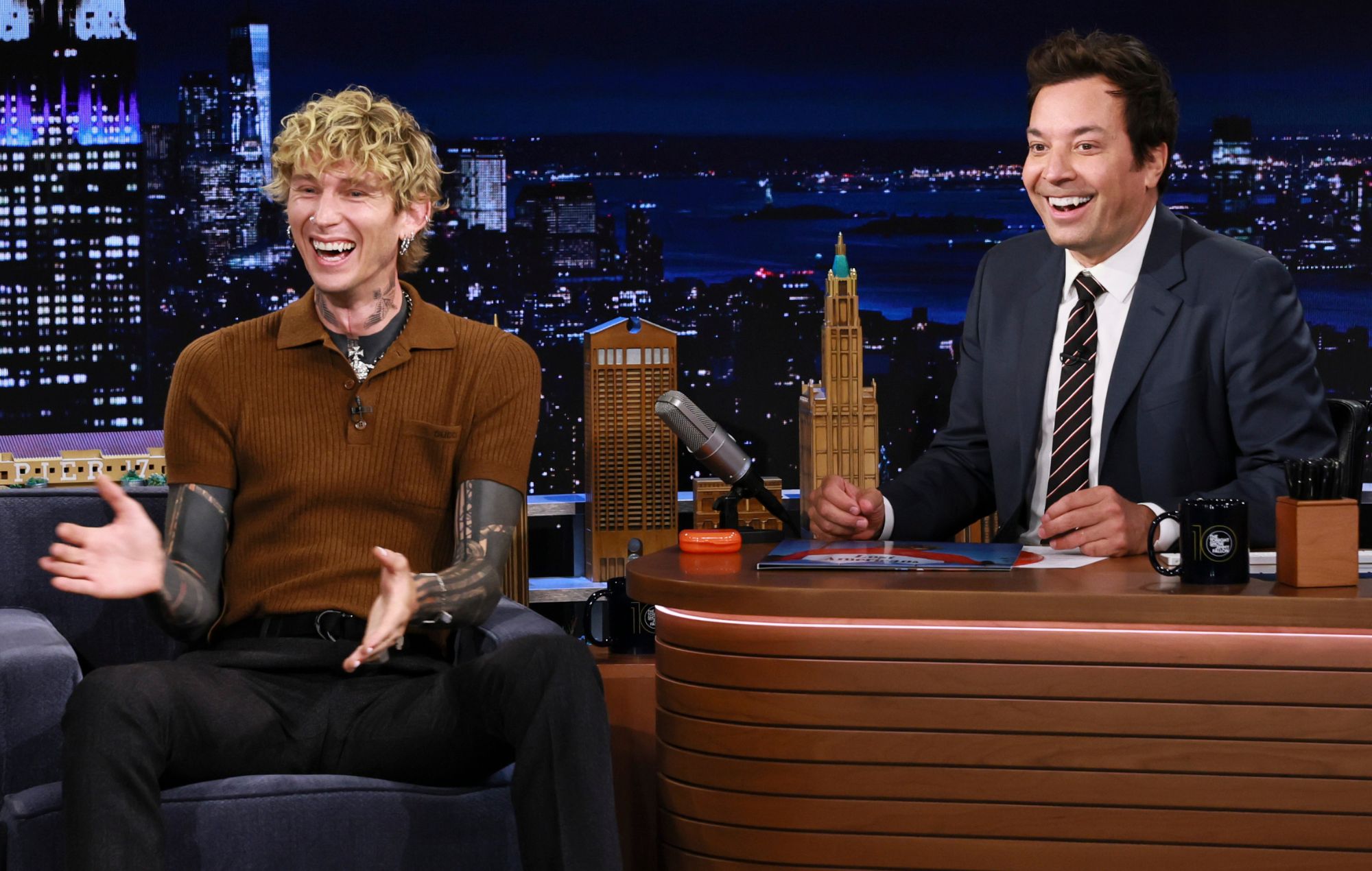 Singer-songwriter mgk during an interview with host Jimmy Fallon on Monday, August 4, 2025 -- (Photo by: Theo Wargo/NBC)